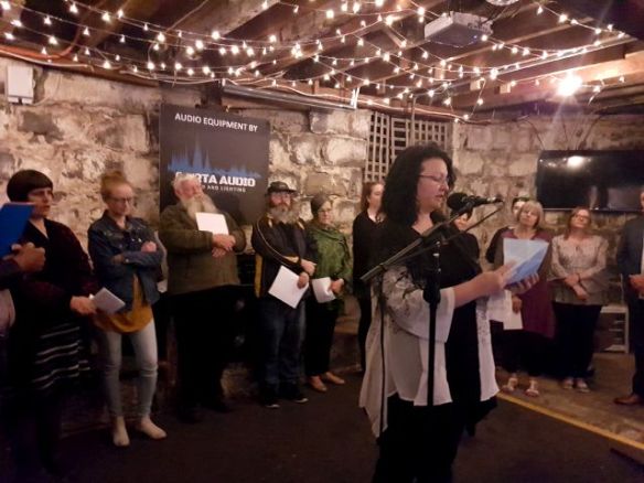 Kirstyn McDermott brings some visual art to her Weathering the Future reading at November's Words Out Loud