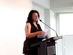 Kirstyn McDermott reads during the launch of Weathering the Future.